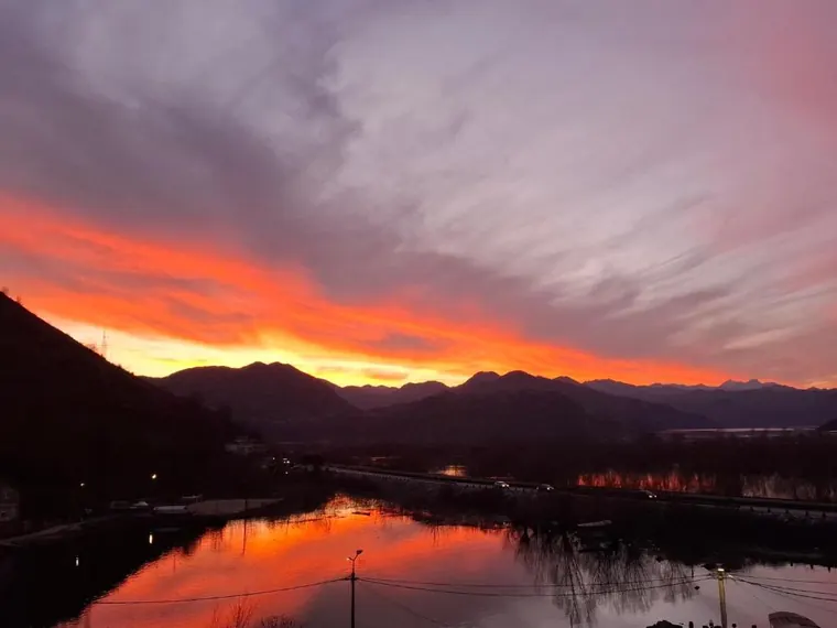 A fiery red sunset over Skadar Lake
