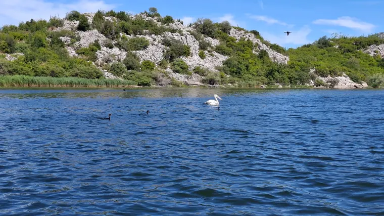 Rocky islands rising from the calm lake