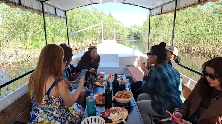 A group relaxing together on the boat