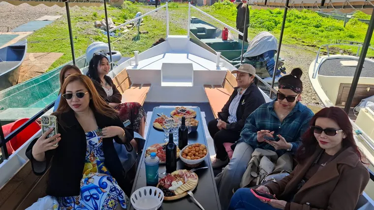 Friends smiling on board