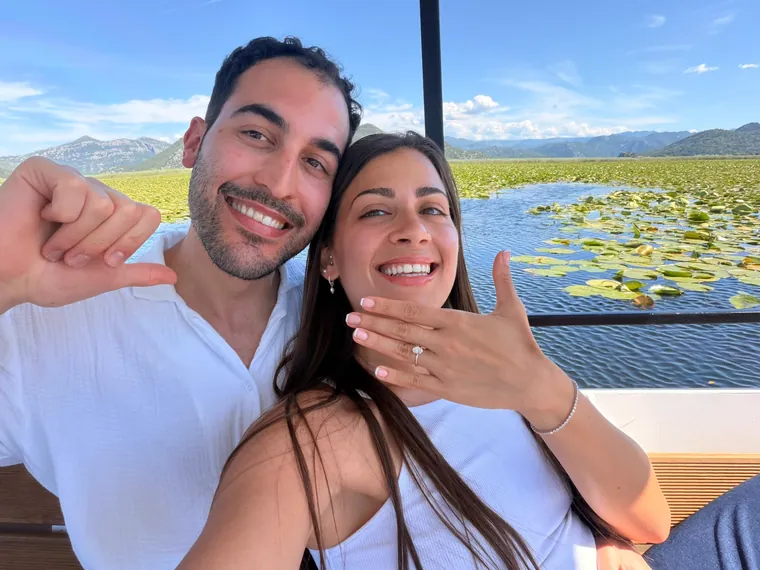 A couple taking a selfie on the boat